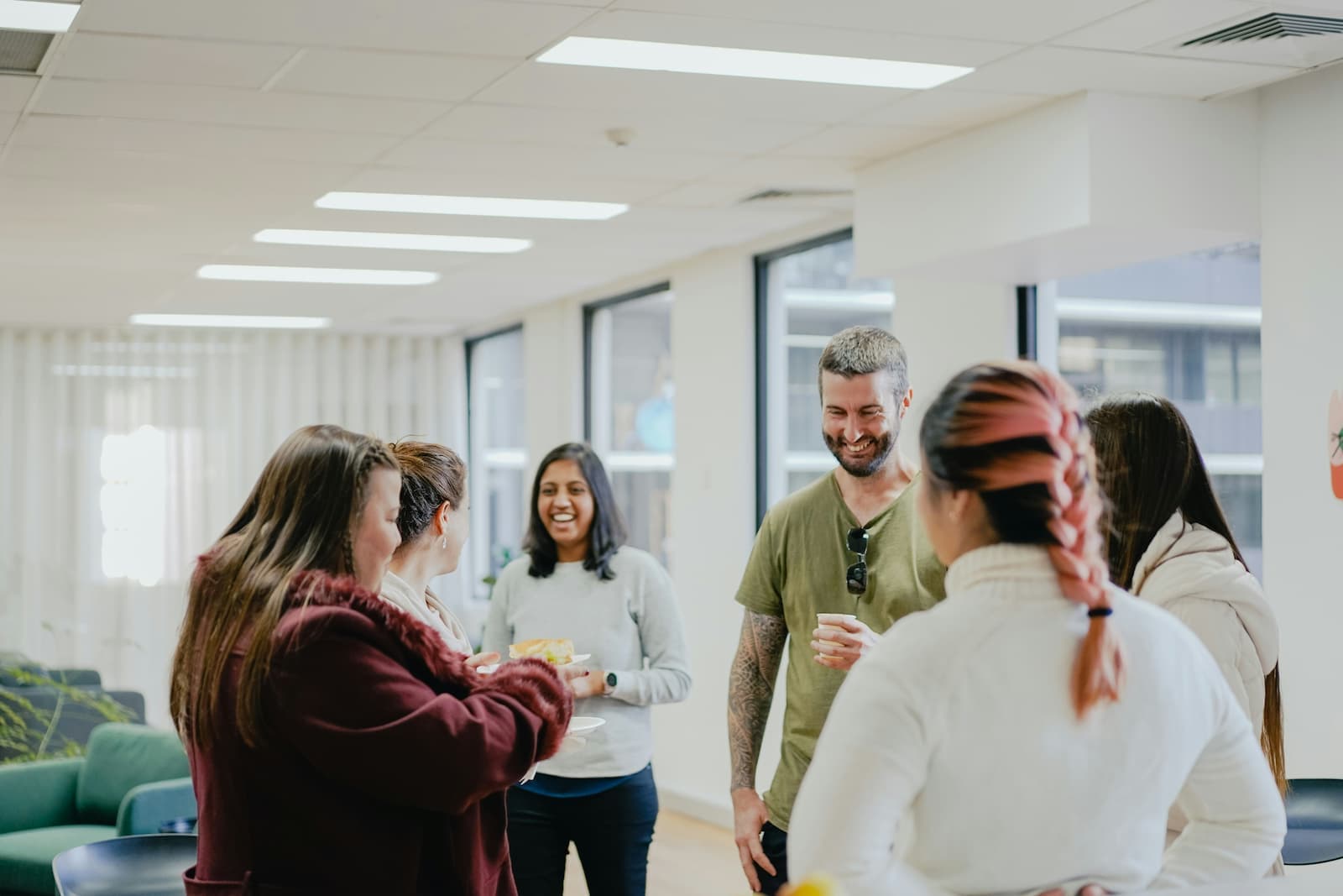 A group of employees having a conversation