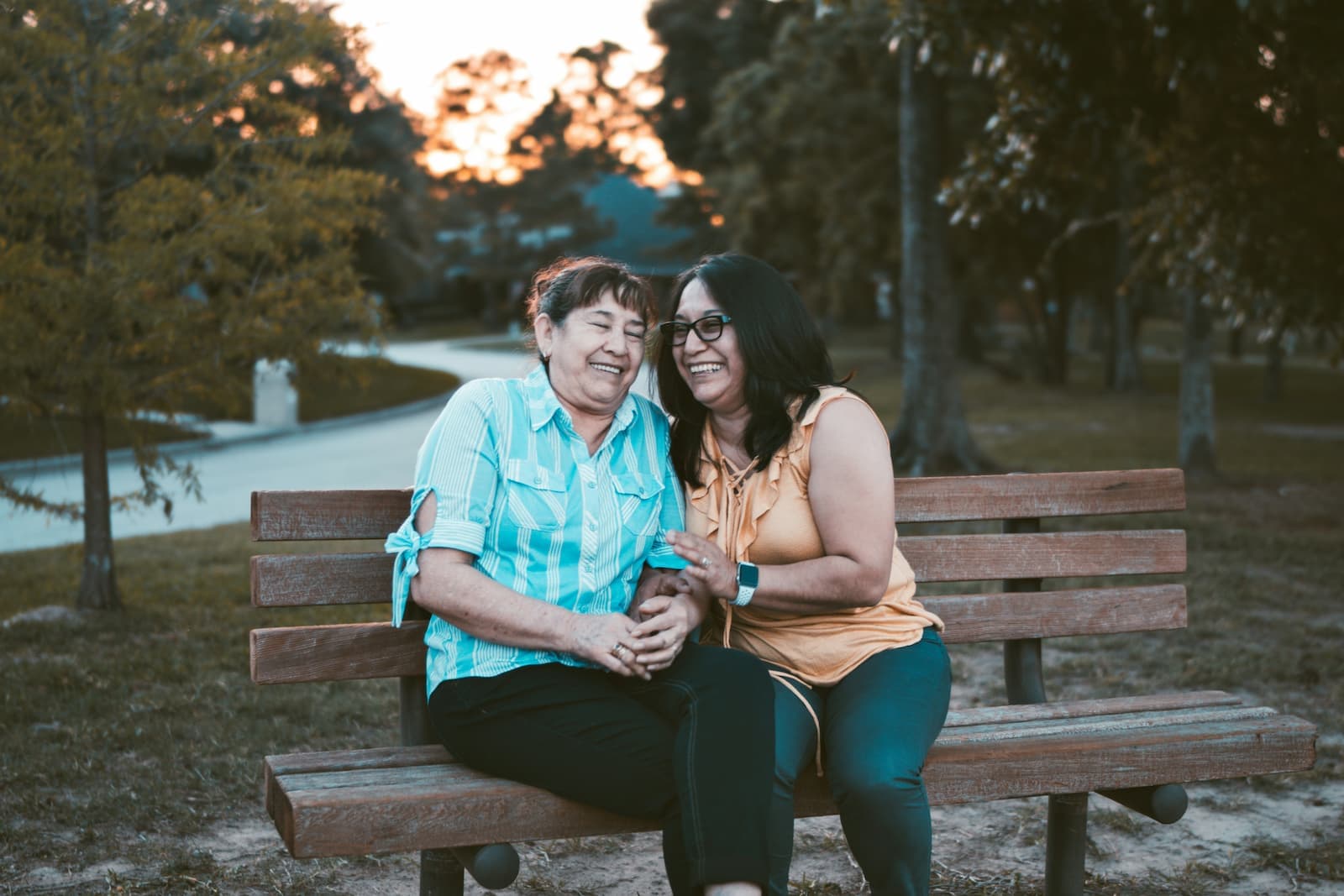 Caregiver and older adult spending meaningful time together outdoors